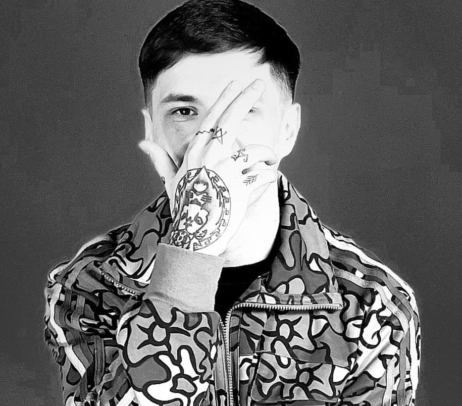 Okan-Press-Shot-1-crp